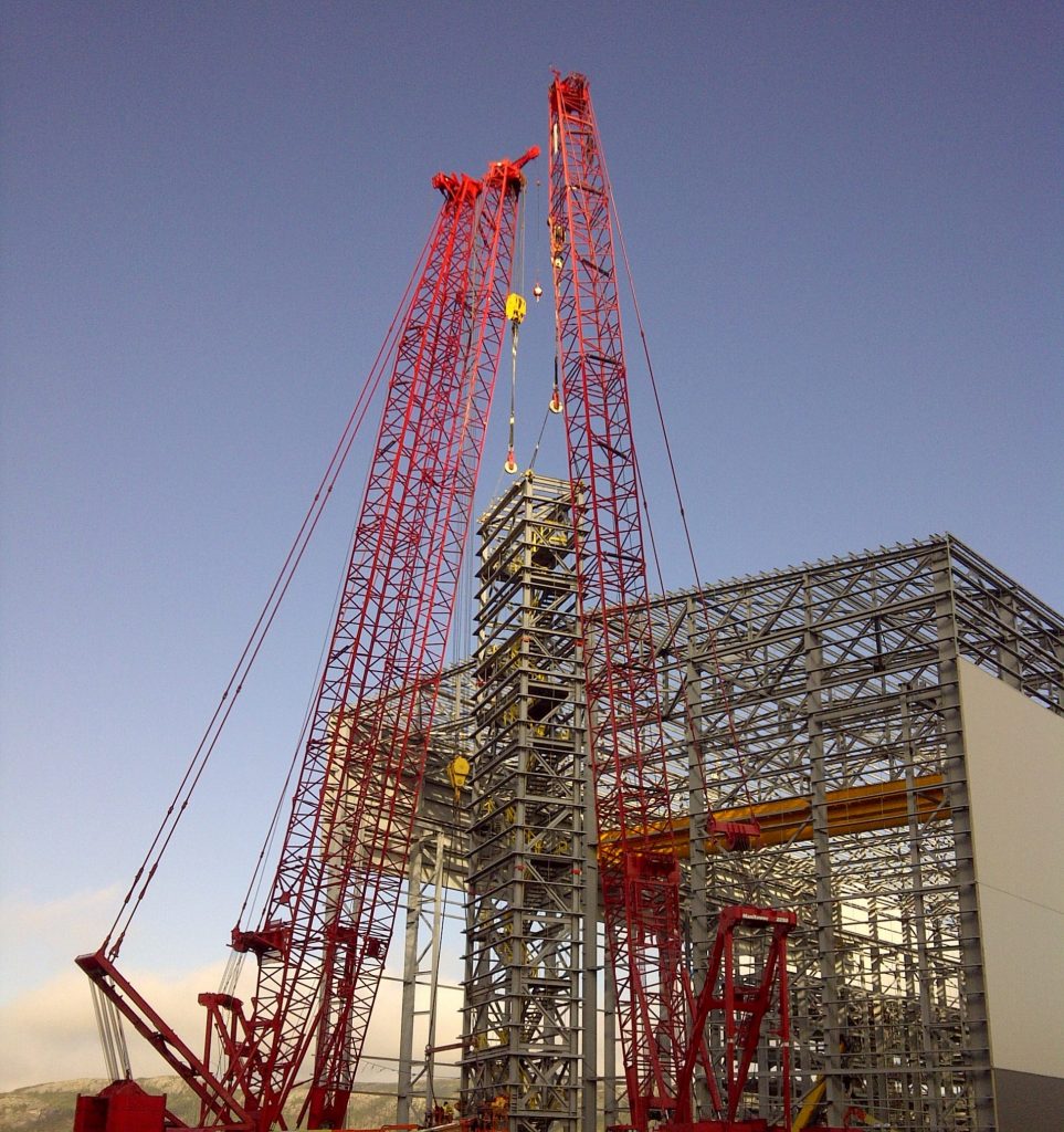 top running crane worker planning critical lift